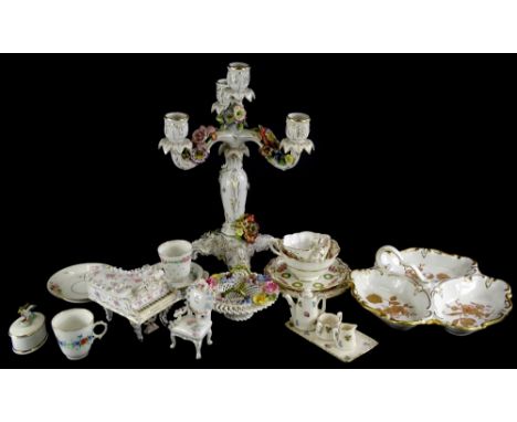 A quantity of English and continental ceramics, to include a piano shaped box, a hors d' ouvres dish, a three branch candelab