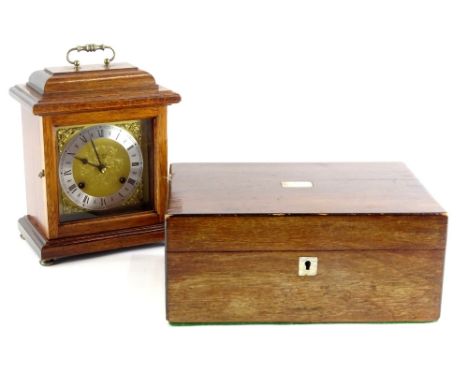 A Woodford mahogany mantel clock, on bun feet, 22cm high, and a mahogany work box.