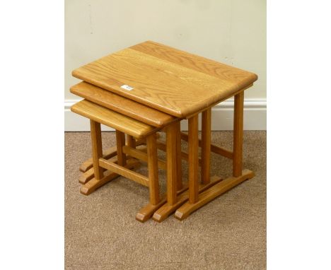 Light oak nest of three tables in an Ercol style, W49cm