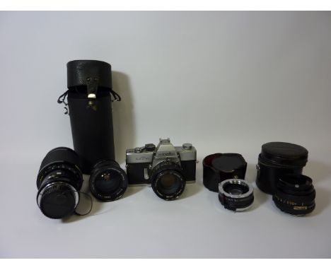 Minolta SRT 101 camera with Vivitar Series 1 70-210mm Lens, other lenses and accessories in a camera bag and a collection of 