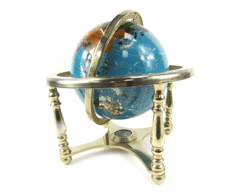 A gemstone inset small tabletop globe, 28cm high, the base 20cm x 20cm. 