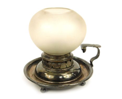 A William IV night light, being a circular silver plated chamber stick with converted shade and marked WR under a crown to th