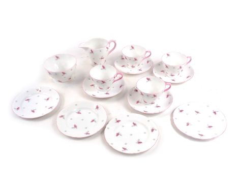 A Shelley part tea service, on a white ground decorated with pink and grey ferns, with pink handle with green Shelley stamped
