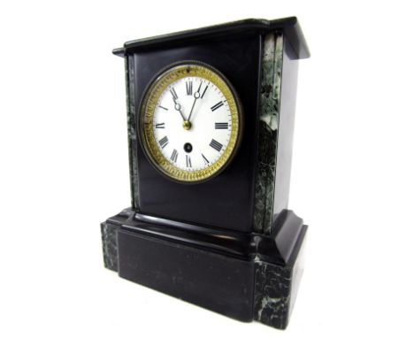A late 19thC French slate mantel clock, with grey mottled supports, on a black marble finish with a brass circular bezel, on 
