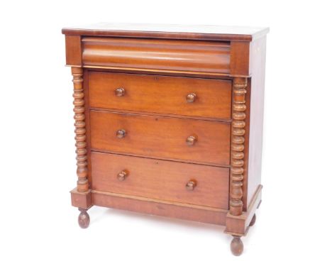 A Victorian mahogany chest of drawers, of plain form with an arrangement of four drawers, three with turned wooden handles, f