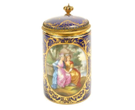 A 19thC Vienna porcelain and gilt metal tankard, with a central portrait panel of two females in evening gown, a crown knop, 