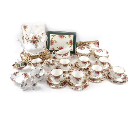 A group of Royal Albert Old Country Roses, comprising teapot, wall clock, lacking hands, seven dinner plates, six medium plat