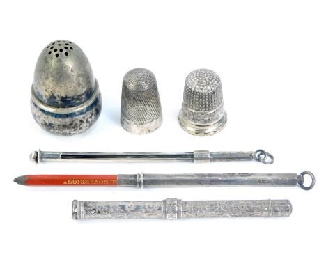 Silver thimbles and bijouterie, comprising two hall marked silver thimbles, three propelling pencils and a white metal acorn 