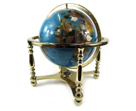 A gemstone globe by Lapis Globes, on a brass effect swivel base, 40cm high, the base 30cm x 30cm. 