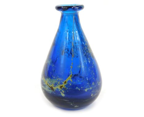 An Art Glass bud vase, on a blue ground with green mottled decoration, possibly Mdina, 10.5cm high.