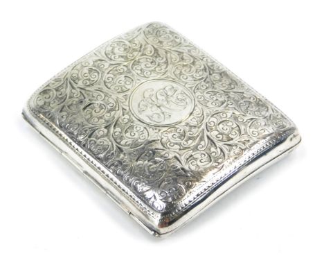 An Edward VII silver cigarette case, with engine turned scroll decoration and bearing the initials JCC, Chester 1902, 3.28oz.