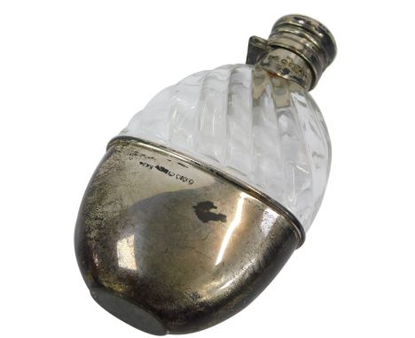 A Victorian silver and moulded glass hip flask, London 1888, 12cm high.