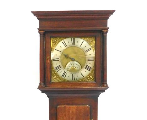 A Georgian oak longcase clock, by Baker of Appleby, square brass dial, with mask and foliate scroll spandrels, silvered chapt
