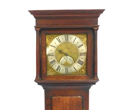 A Georgian oak longcase clock, by Baker of Appleby, square brass dial, with mask and foliate scroll spandrels, silvered chapt