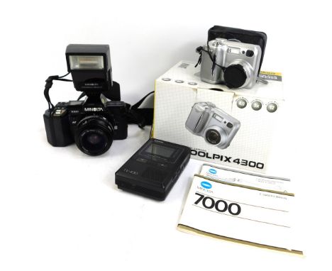 A Nikon Coolpix 4300 camera, Minolta 7000 camera, Minolta 35-70mm 1-4 lens, a Casio TV-430 and flash. (a quantity) 