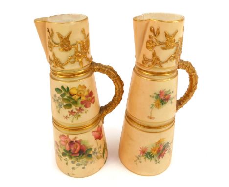 A pair of Royal Worcester blush porcelain jugs, c1903, of tapering form, shape no 1047, painted with sprays of flowers, print