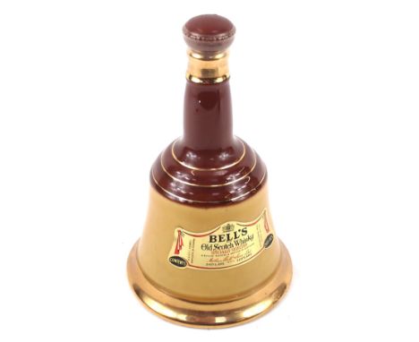 A Bell's Old Scotch whiskey decanter and contents. 