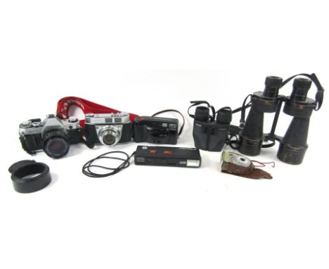 Camera and optics equipment, comprising a pair of Binoprism number 5 binoculars, Canon Sure Shot Supreme camera, Minolta auto