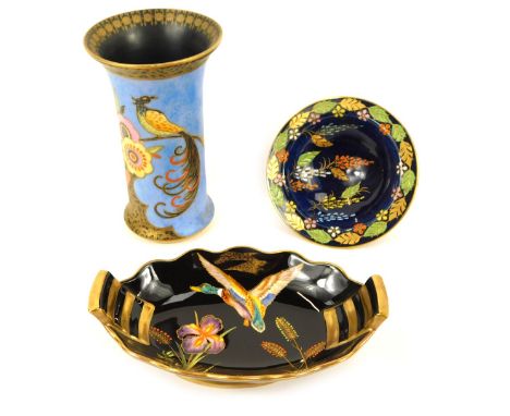 A Carltonware pottery vase, of trumpet form, painted with an exotic bird and flowers against a pale blue ground, printed mark