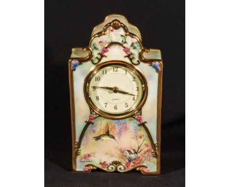 A hand painted porcelain mantle clock