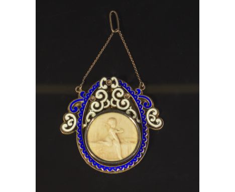 A gilt silver and enamel pendant, centre medallion carved ivory depicting cherub, marked to back