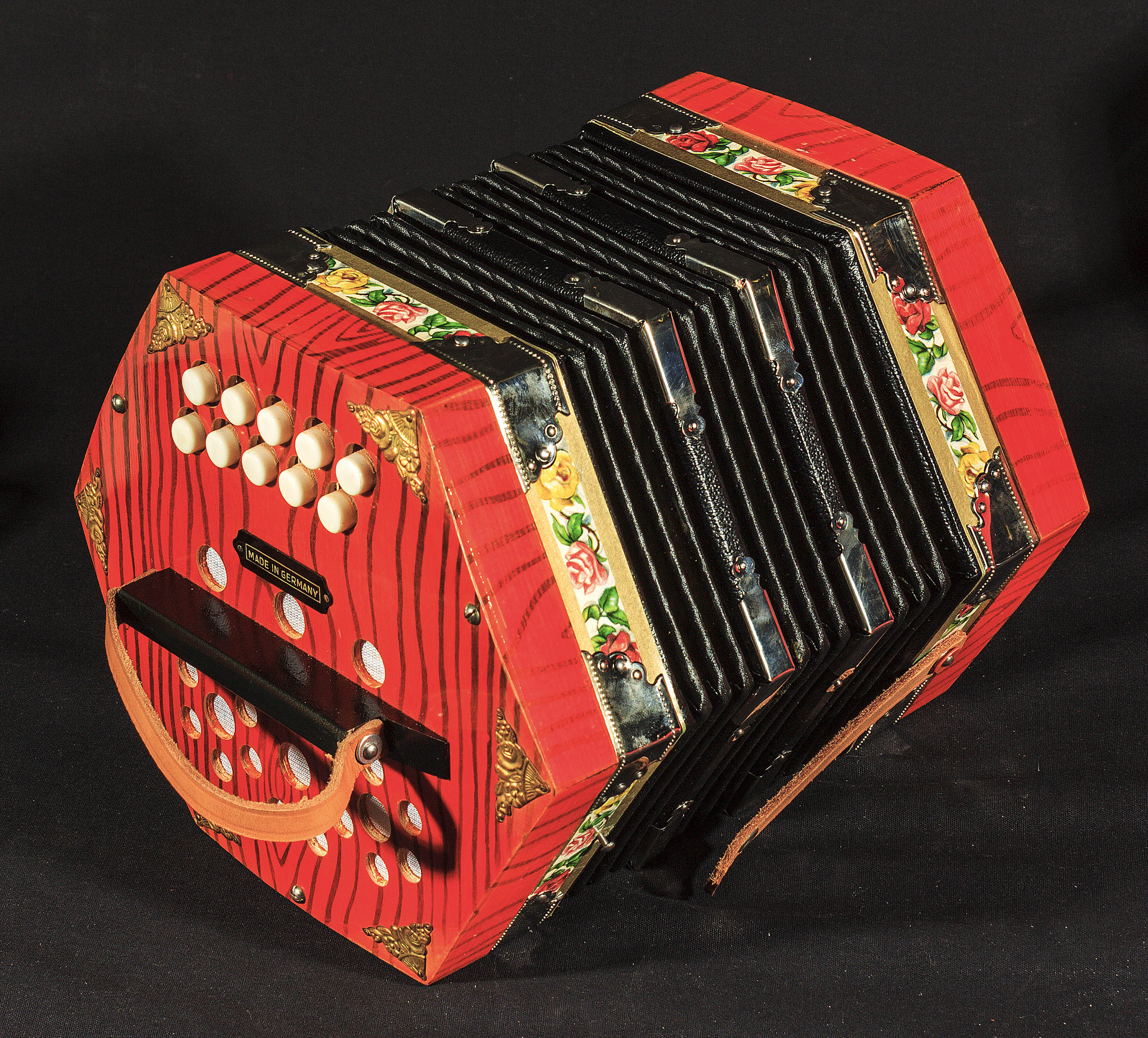 A boxed Scholer concertina, made in Germany