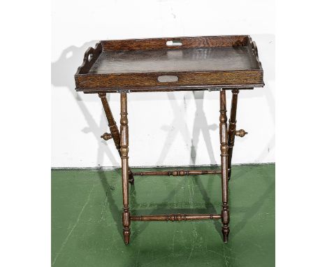An oak butlers tray on stand.