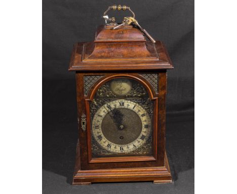 A Walnut bracket clock.