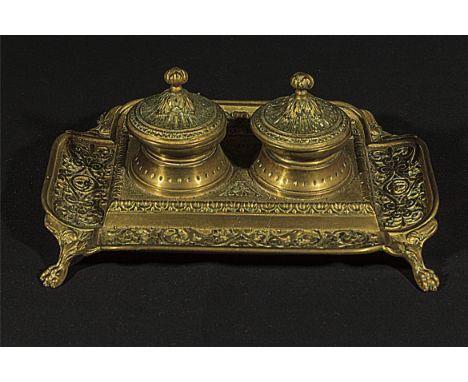 A brass inkwell set