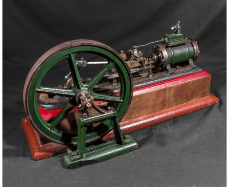 An engineer's model of a steam pump and fly wheel