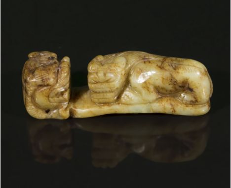 A jade lion, 10cm long.