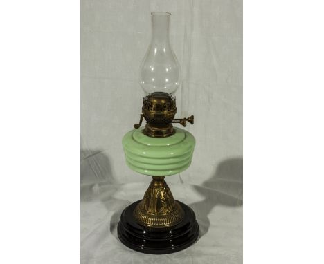 A Victorian oil lamp.