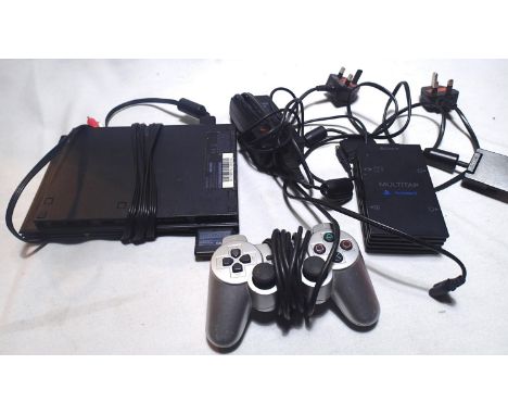 PlayStation 2 Slim console with controller and accessories. P&amp;P Group 1 (£14+VAT for the first lot and £1+VAT for subsequ