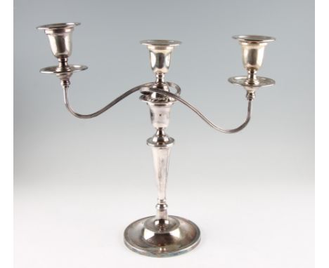A single silver weighted candelabra, with knopped stem on circular foot, hallmarked Sheffield 1963, with makers mark for E H 