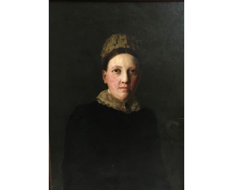 A framed, unsigned, oil on canvas portrait of a lady.