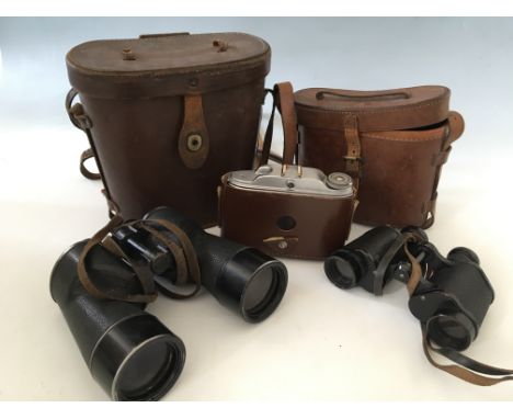 A pair of Wray London 6E/293 binoculars in leather case, together with one other pair of binoculars in leather case and a cam