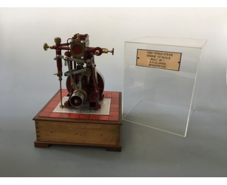 A model by Arnold Clarke, high speed steam engine, 1/8” scale in Perspex cabinet