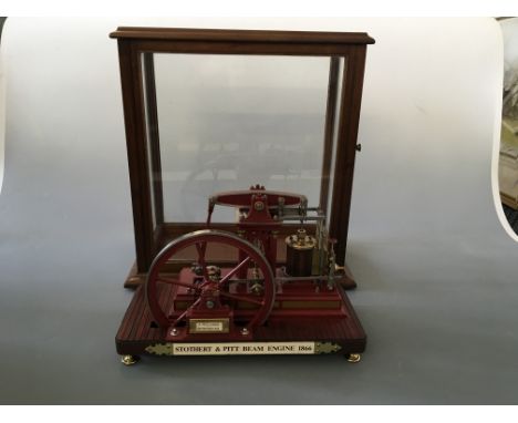 A model by Arnold Clarke, Stothert and Pitt beam engine, 1866 in glazed mahogany case, 1/12 scale.