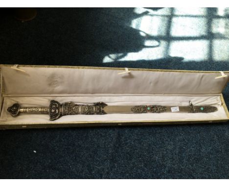 A reproduction Chinese sword in scabbard, boxed