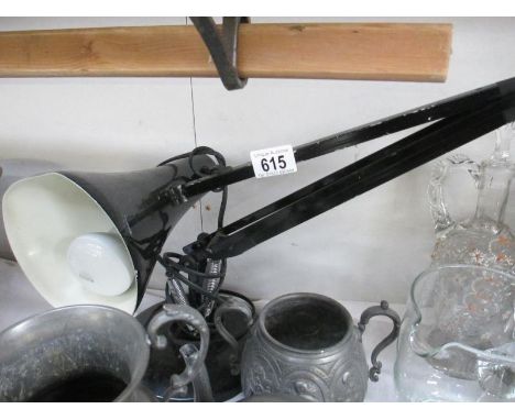 An angle poise lamp