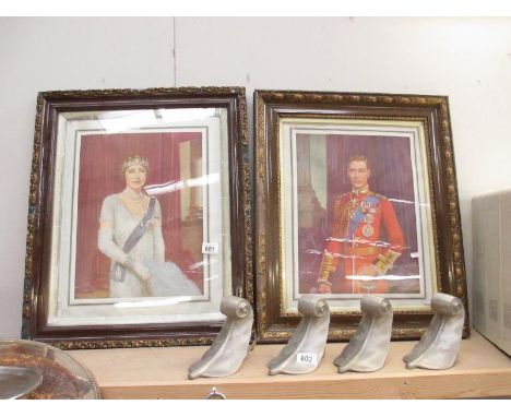 A pair of framed and glazed  portrait prints of King George VI and Queen Elizabeth a/f