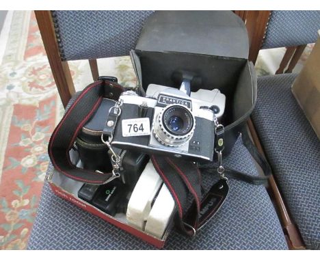 A Praktica PL NOVAL camera, Polaroid Land Camera Swinger Model 20 with cases and other camera accessories