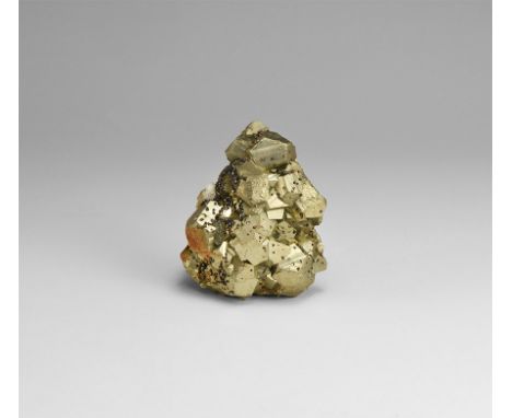 A fine formation of pyrite polygons with miniature sphalerite crystals, in white card tray with label reading: 'PYRITE with S