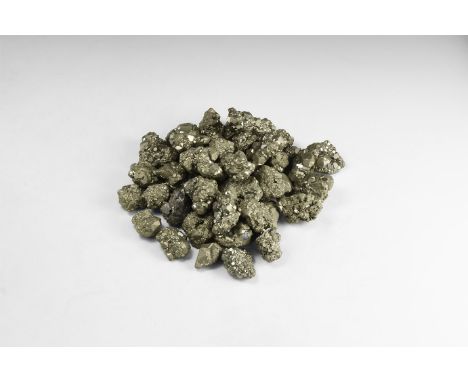 A group of fifty pyrite specimens exhibiting principally pyritohedral and pyrito-octahedral crystal forms. 1.47 kg total, 23-