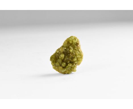 A fine specimen of apple-green idocrase (vesuvianite) crystals on a matrix, in white card with hand-written old label reading