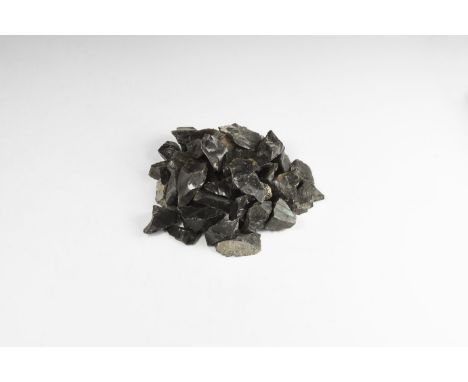A group of fifty black obsidian pieces. 340 grams total, 28-44mm (1 - 1 3/4"). From the historic ‘Victorian Museum’ and later