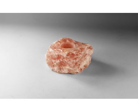 A rose quartz candle holder for either long candle or tea light, with a felt bottom. 1.3 kg, 10.4cm (4"). From the historic ‘