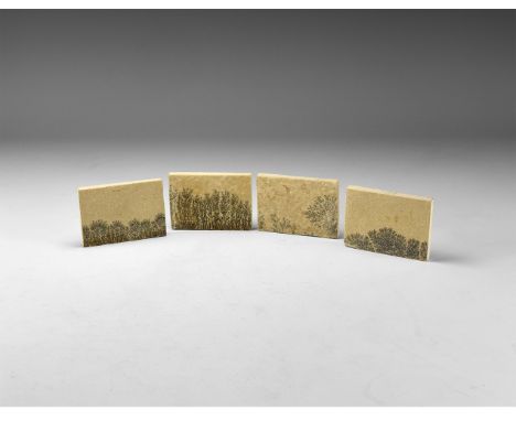 A group of four sawn rectangular shale specimens with manganese oxide dendrites. 214 grams total, 64mm (5 1/2"). From the his
