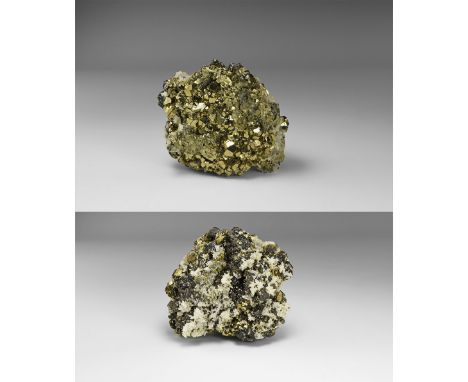A spectacular specimen of bournonite with pyrite and quartz comprising numerous well-formed and lustrous bournonite crystals 