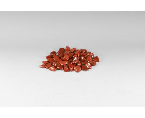 A group of fifty bright red polished jasper specimens. 398 grams total, 20-33mm (3/4 - 1 1/4"). From the historic ‘Victorian 